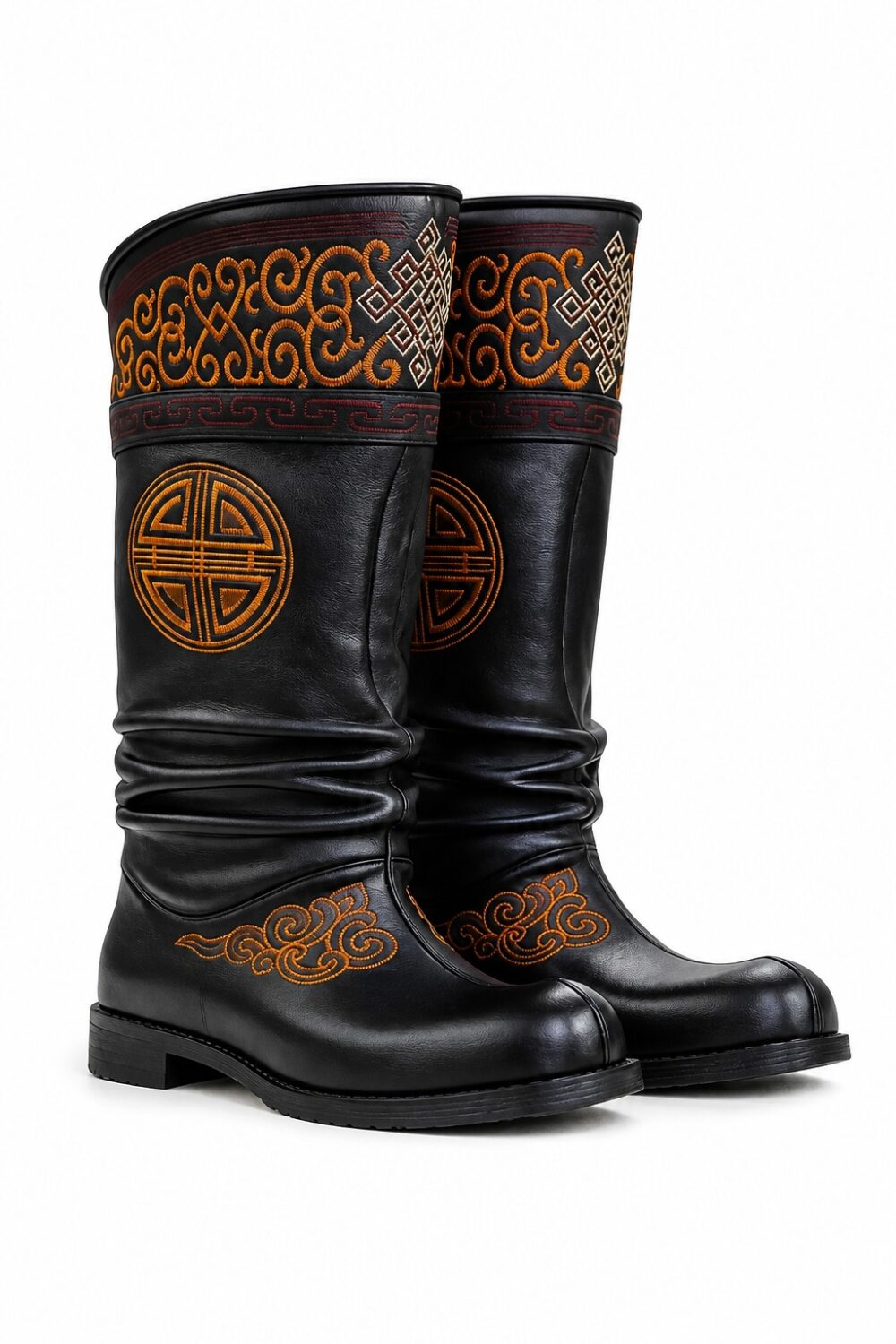 Embroidered black leather boots on white