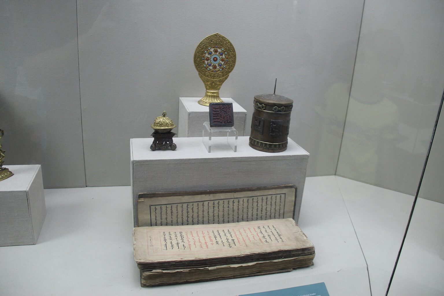 Mongolian Book-Making: Manuscripts, Printing and Sacred Art 4 Historic Mongolian Buddhist manuscript displayed in a museum